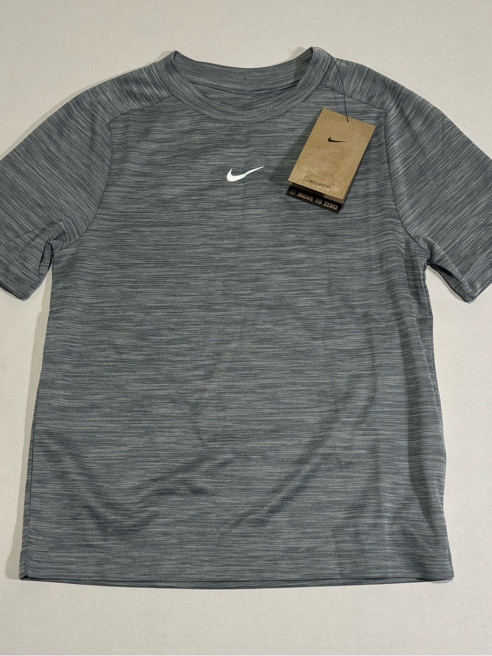 Nike Multi Big Kids' XS Dri-FIT Short-Sleeve Top in a heathered grey
